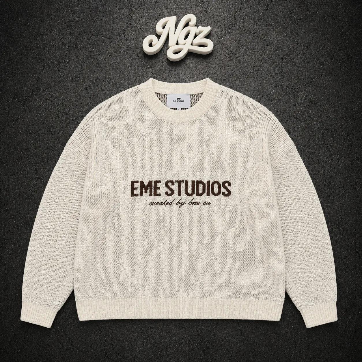 Master Off Sand Knit Sweater EME Studios — buzo streetwear original, vista frontal